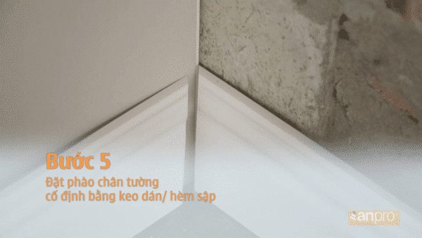 dat phao chi chan tuong co dinh 600x338 - Hướng dẫn lót sàn nhựa giả gỗ trong 5 bước chính xác